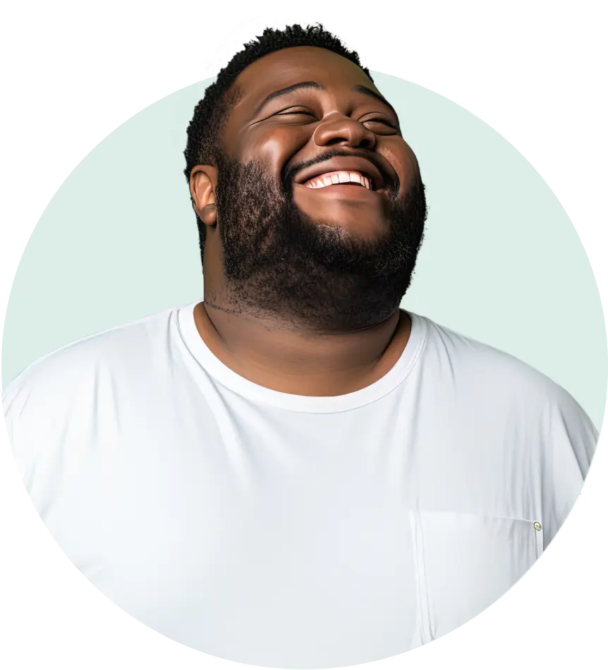Happy man smiling, representing confidence and results from GLP-1 weight-loss support.